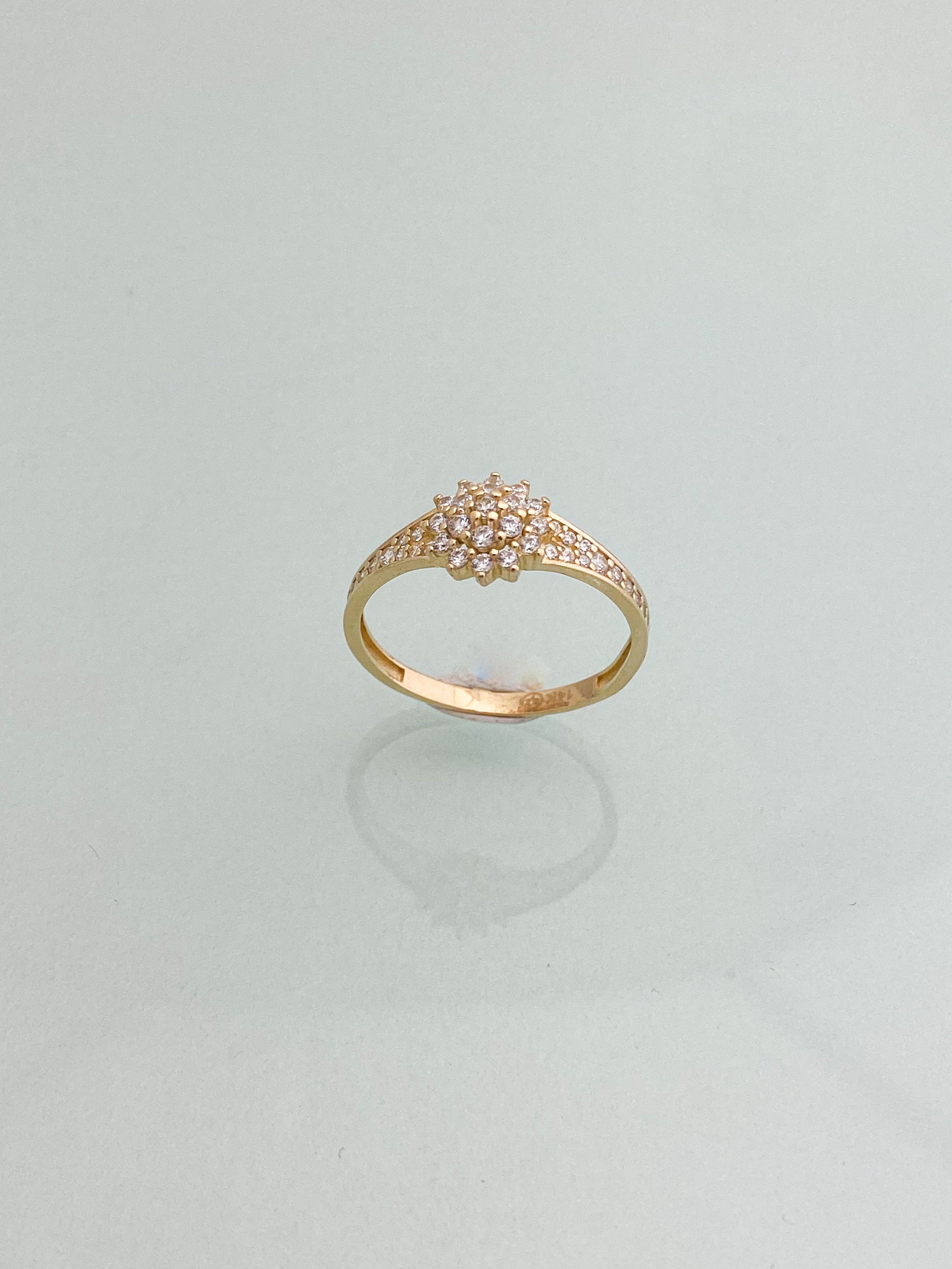 טבעת פרח זהב 14 קארט משובצת זירקונים