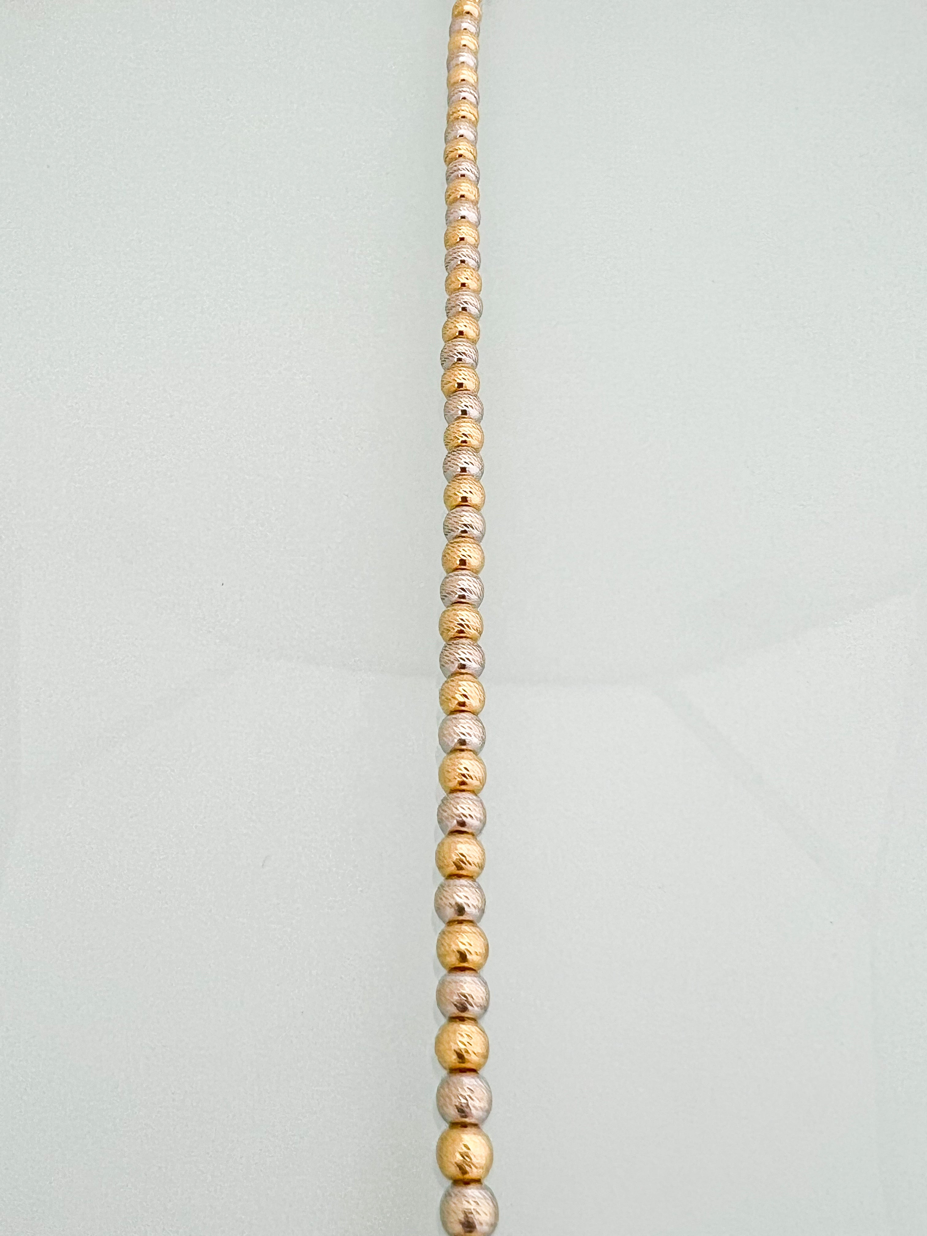 צמיד כדורי לייזר משולב זהב צהוב ולבן 14 קארט