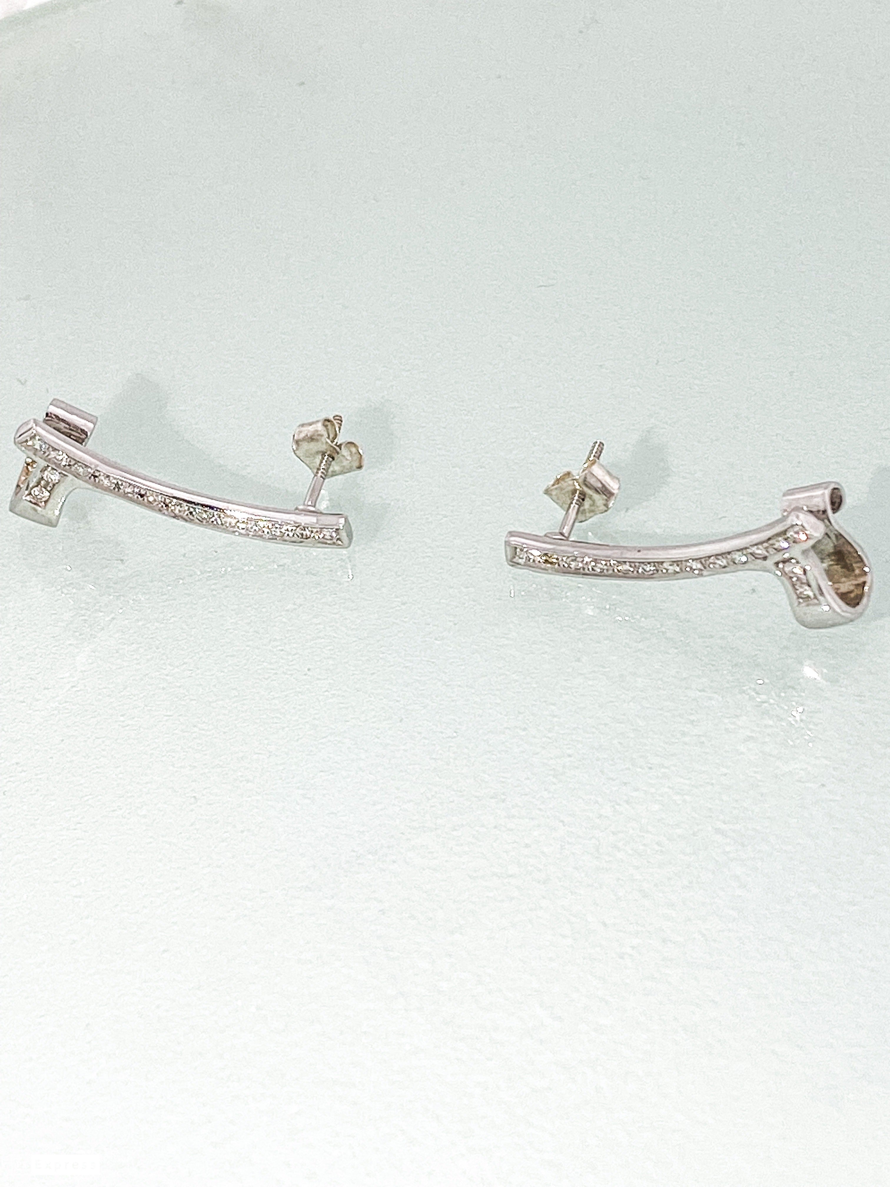 עגיל מטפס זהב 14 קארט משובץ יהלומים