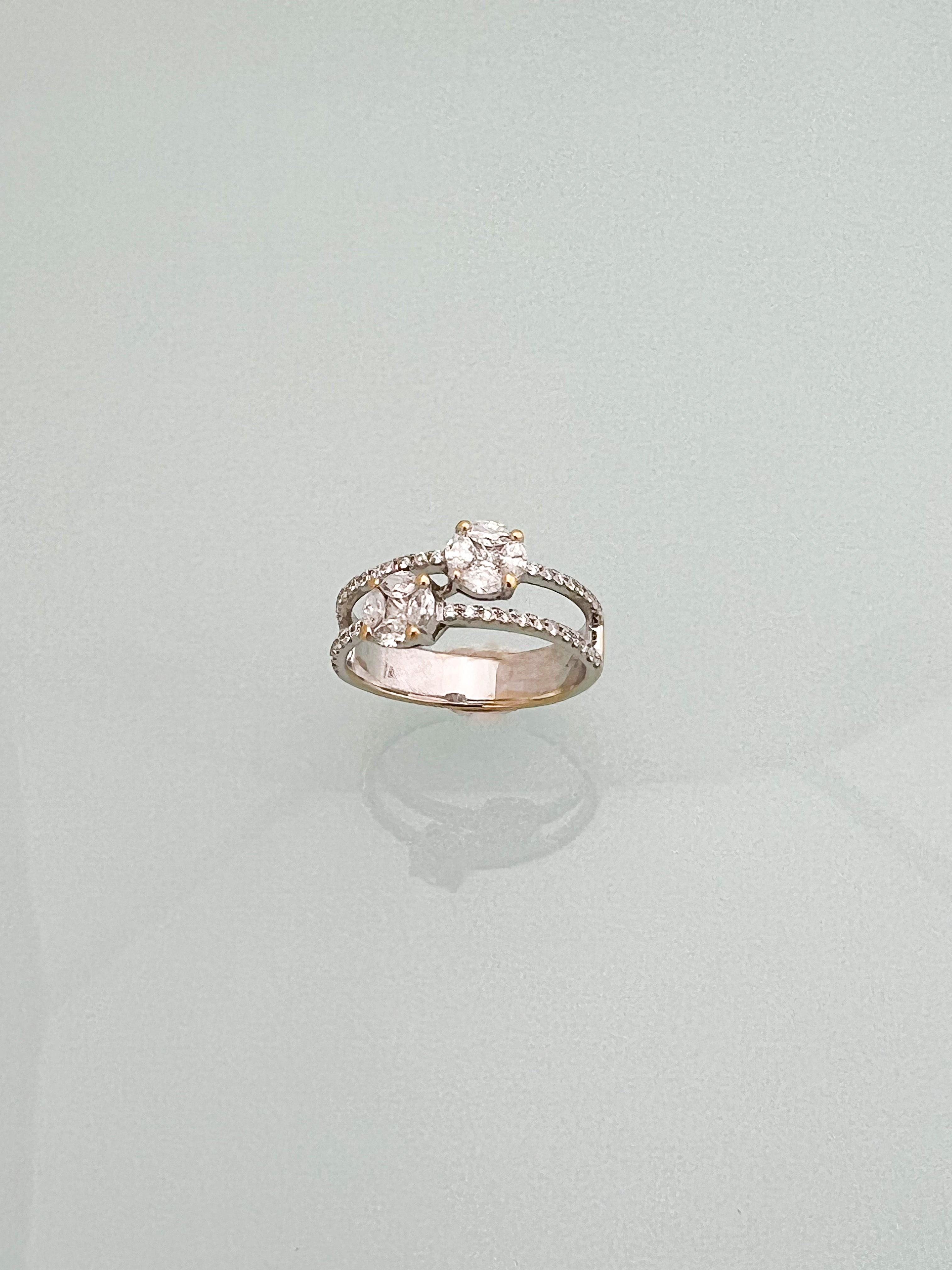 טבעת 18 קארט שתי שורות עם עיגולים משובצים יהלומי מרקיזות ויהלומים בצדדים