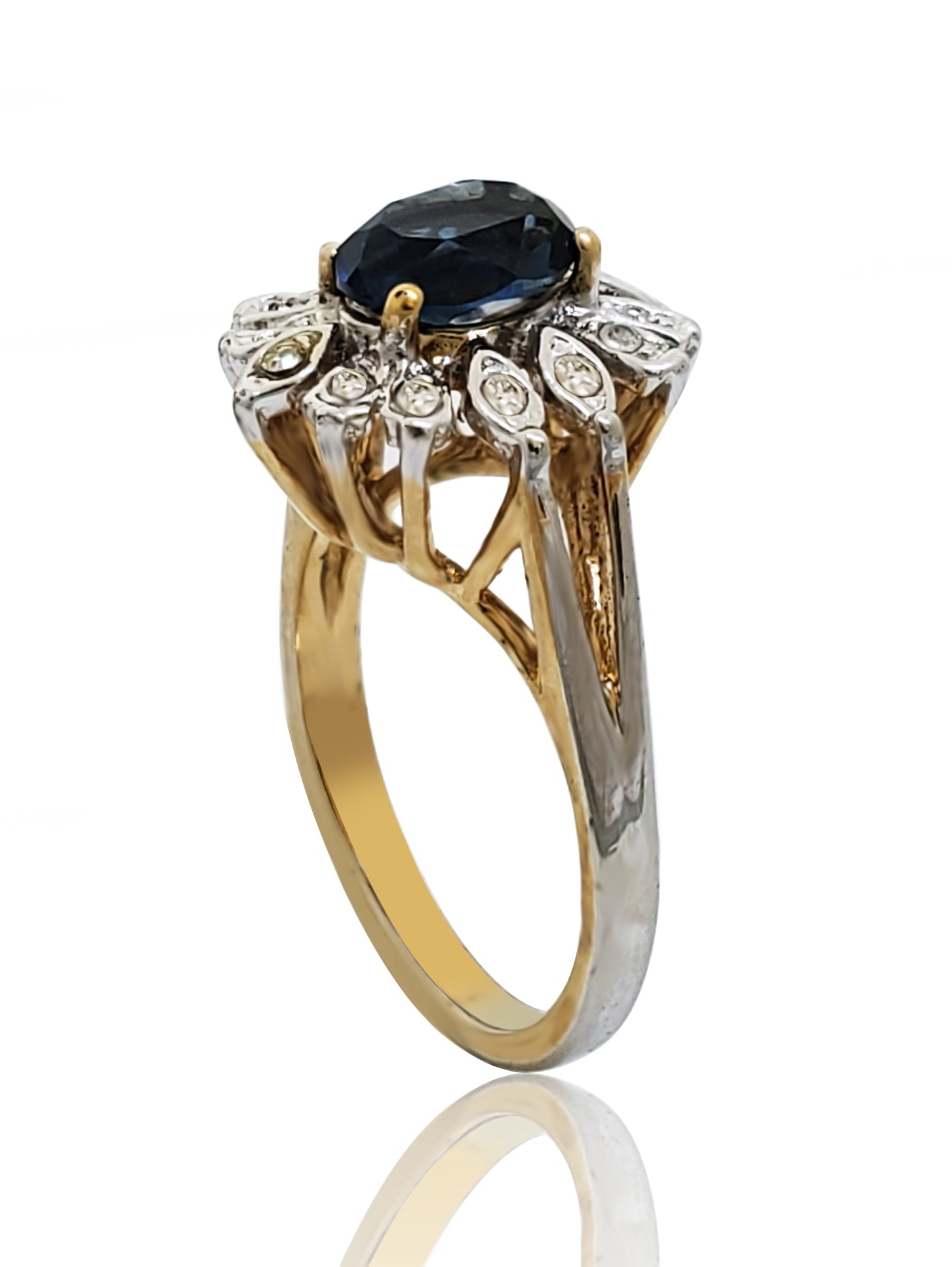 טבעת פרח זהב עם אבן כחולה וזירקונים