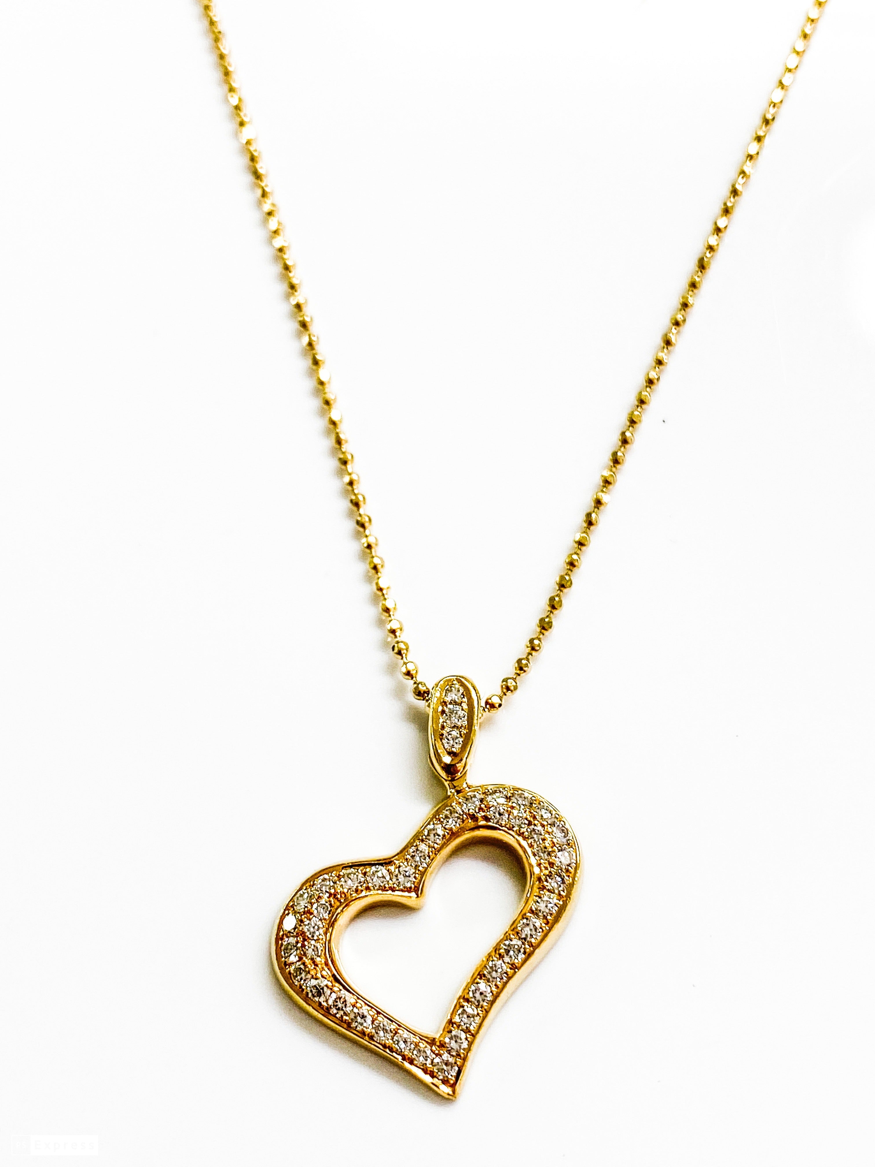 שרשרת זהב צהוב 14 קארט דוגמת עיגולים עם תליון לב משובץ יהלומים