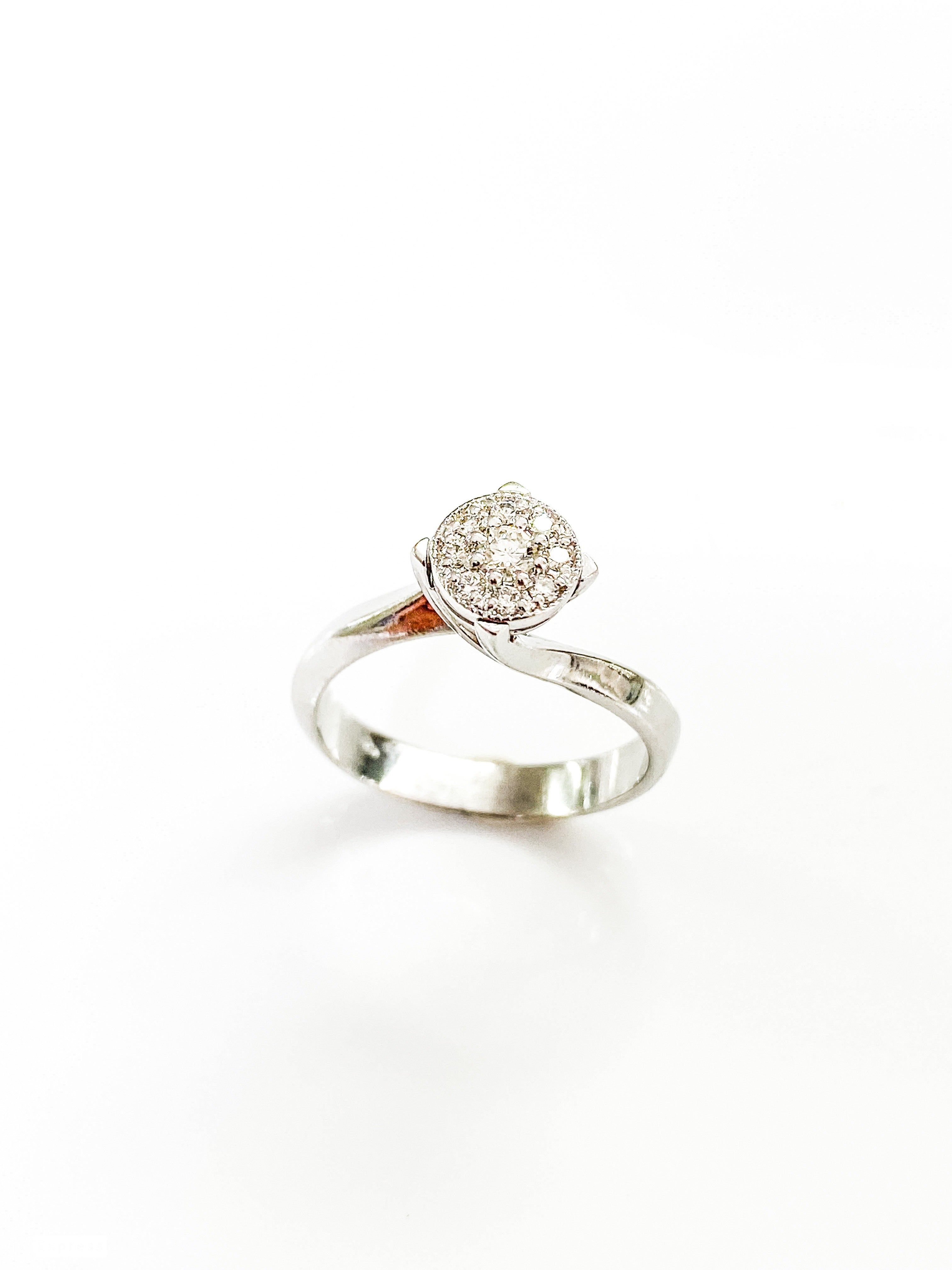 טבעת זהב 14 קארט  לבן עם עיגול יהלומים
