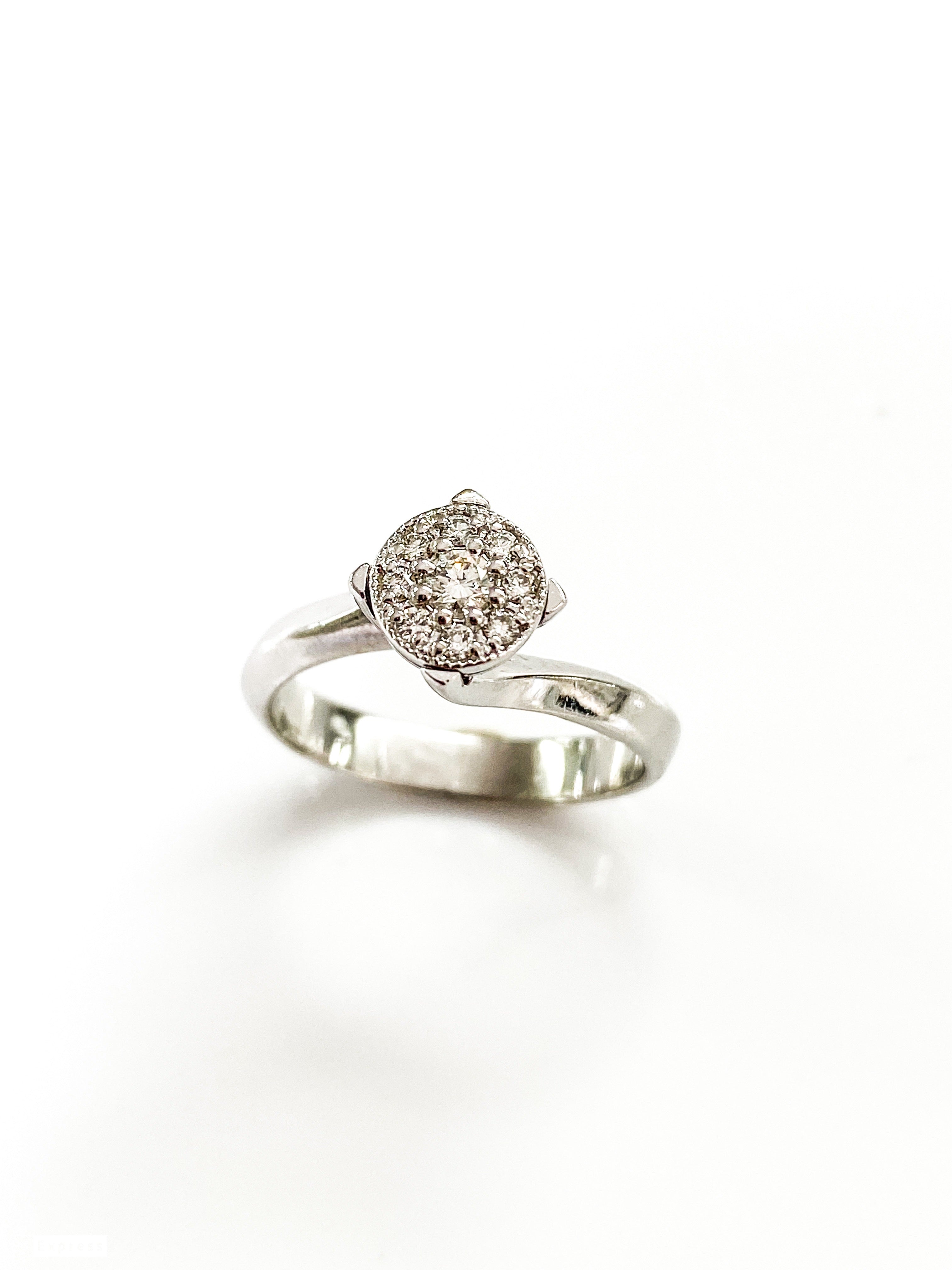 טבעת זהב 14 קארט  לבן עם עיגול יהלומים